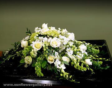 White Elegance Casket Spray